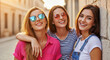 © PhotoArtHub - Three smiling women in sunglasses with casual attire, symbolizing friendship, summer, and carefree joy, perfect for lifestyle content.