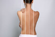 © New Africa - Levels of tanning. Collage showing woman with various skin tones on grey background, closeup