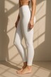 © Rawpixel.com - White leggings fitness fashion
