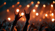 © ArtShop - Hands making rock sign at concert with bright stage lights