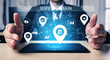 © InfiniteFlow - A businessman showcases a digital supply chain concept using a tablet, featuring interactive icons. The image highlights innovation and technology in modern business practices. Ledger