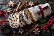 © musthofa - Sliced festive fruit cake with cinnamon and star cookies