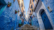 © Robin - Narrow alleyway with blue painted walls and stairs in Chefchaouen Morocco 2.