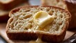 © Wuttichai - A pat of butter melts slowly into a warm slice of bread  highlighting crisp texture and golden crust