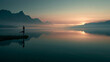 © BlackBridge Media - Woman Practicing Yoga at Sunrise by Mountain Lake