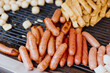 © Heng Yu/Stocksy - Grilled Sausages and Street Food on Barbecue Grill