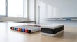 © Stitch - Set of colorful whiteboard markers arranged in a row next to a thick eraser on a wooden desk