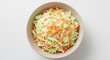 © lananh - Bowl of Coleslaw: A close-up shot reveals a refreshing bowl of coleslaw, a delightful mix of shredded cabbage and carrots, perfect for any meal.