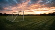 © mytour - Lonely Soccer Goal on Empty Field During Golden Sunset