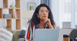 © peopleimages.com - Laptop, remote work and thinking with woman in home office for planning, research or solution. Computer, future and vision with freelance employee at table in apartment for ideas or problem solving