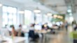 © CuteBee - Blurred modern office interior with employees working at desks in bright open space environment suitable for corporate business backgrounds and professional website imagery
