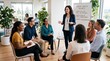 © Jieun - Diverse group of employees attending mental health wellness workshop led by female trainer discussing stress management strategies, work life balance support in modern bright of...