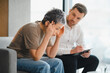 © Serhii - Woman getting psychological help from a caring psychotherapist