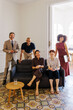 © BONNINSTUDIO/Stocksy - Business team smiling in creative office space