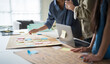 © saksit - Business hands creating project mind map with colorful sticky notes