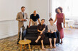 © BONNINSTUDIO/Stocksy - Business team smiling in office lounge