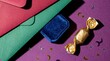 © tilialucida - Close detail of Eid envelopes, favor wrap, and metallic confetti