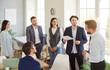 © Studio Romantic - Business people group, team leader giving presentation of new project in boardroom at company meeting, confident speaker talking to partners about business, communication for consulting professionals