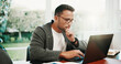 © peopleimages.com - Freelancer, man and thinking with laptop in home for source finding, audit accuracy and decision. Remote work, accountant and reflection with tech for financial reporting, tax preparation and insight