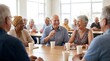 © Pixim Stock - Group of happy senior people talking together at community center while having coffee during social meeting and card game session indoors at table with bright natural light in room.