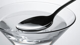 Spoon in martini glass