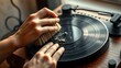 © Minh - Close up of hands cleaning vintage vinyl record with velvet brush on turntable, nostalgic analog music hobby concept