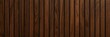 © Ahmed - Dark walnut wood slat wall texture, vertical timber paneling background for interior design, elegant brown wooden lath surface, architectural wood cladding backdrop for luxury decor