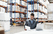 © peopleimages.com - Laptop, logistics and documents with man in warehouse for delivery route, shipping schedule and order. Planning, ecommerce depot and checklist with employee and tech in factory for cargo procurement