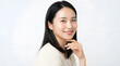 © PTC - Young Japanese Woman with Radiant Skin Smiling Gently for a Beauty and Skincare Portrait
