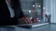 © InfiniteFlow - A business professional engages with a digital interface, revealing cybersecurity threats and alerts, enhancing data security and risk management in a modern office setting. Ledger