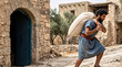 © pufanya - Biblical farmer in ancient blue tunic carrying a heavy woven sack of grain on his shoulder. Judean laborer walking up a sloped stone road in an old village with stone buildings and olive trees