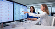 © Andrey Popov - Healthcare Manager Studies Patient Records On Computer