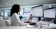 © Andrey Popov - Woman Doctor Managing Medical Licensing Data Efficiently On Laptop