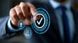 © Nataliya - Faceless business person touching a digital screen with quality assurance and certification icons, modern tech interface, with copy space