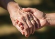 © Lakhi - Two people shaking hands for a successful business deal
