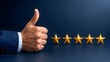 © Jesmin - Person giving thumbs up with five star rating