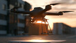 © BlackBridge Media - Delivery Drone Carrying Package at Sunset