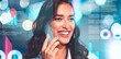 © Prostock-studio - Smiling Young Caucasian Woman Engaged In Phone Conversation While Presenting Ideas At Her Workspace In Modern Office Environment. Energetic Atmosphere And Professional Business Concept.