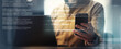 © Prostock-studio - Focused Unrecognizable Individual Engaged With Smartphone While Working On Laptop At Modern Office Desk, Surrounded By Digital Data, Representing Advanced Technology And Productivity Concept.