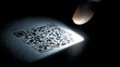 © basilia - Finger scanning a QR code