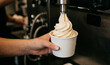 © Alingga - The ice cream preparation process looks hygienic with neat, professional serving.