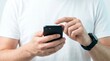 © Yurgentum - Close-up of a man using a smartphone, focusing on typing and interaction.