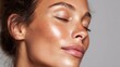 © SynthiView - Close-up of a woman's face with dewy, glowing skin and freckles