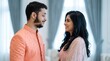© Best - Smiling man and woman talking in a bright room with green curtains