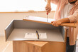 © Pixel-Shot - Man with screwdriver assembling chest of drawers at home