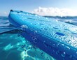© sangnging - Blue watercraft surface with water droplets and bubbles, ocean