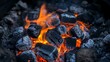 © Md Nurul - Burning charcoal briquettes with intense orange flames close up view for dramatic effect