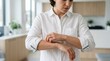 © mdtuhin - Woman scratching itchy forearm skin. Person suffering from skin irritation or allergy.