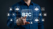 © MdSona - Businessman Touching Virtual Screen Showing B2C Business Concept Interface