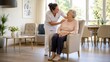 © zuchero - Caring Female Nurse Laughing with Happy Senior Woman in Assisted Living Home
